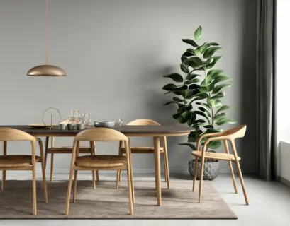 Esszimmer mit braunem Tisch und Pflanze im Fenghshui Design